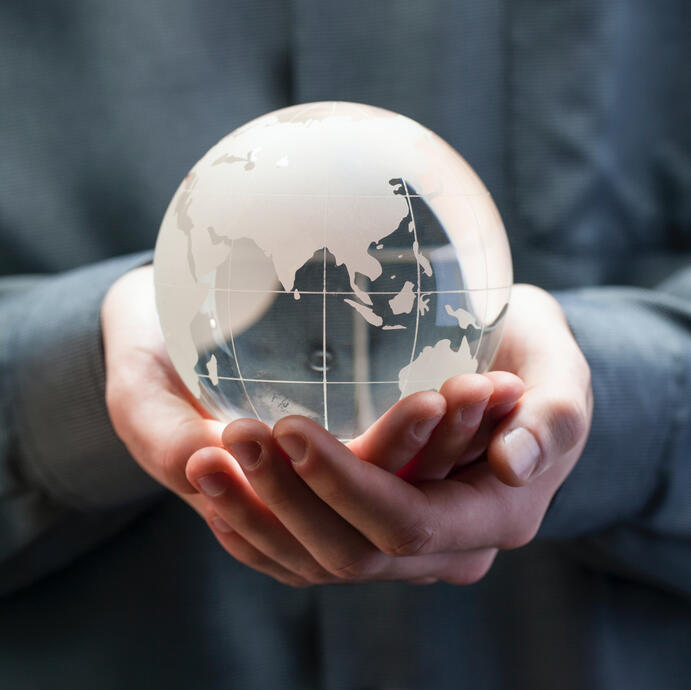 a person typing on a computer keyboard